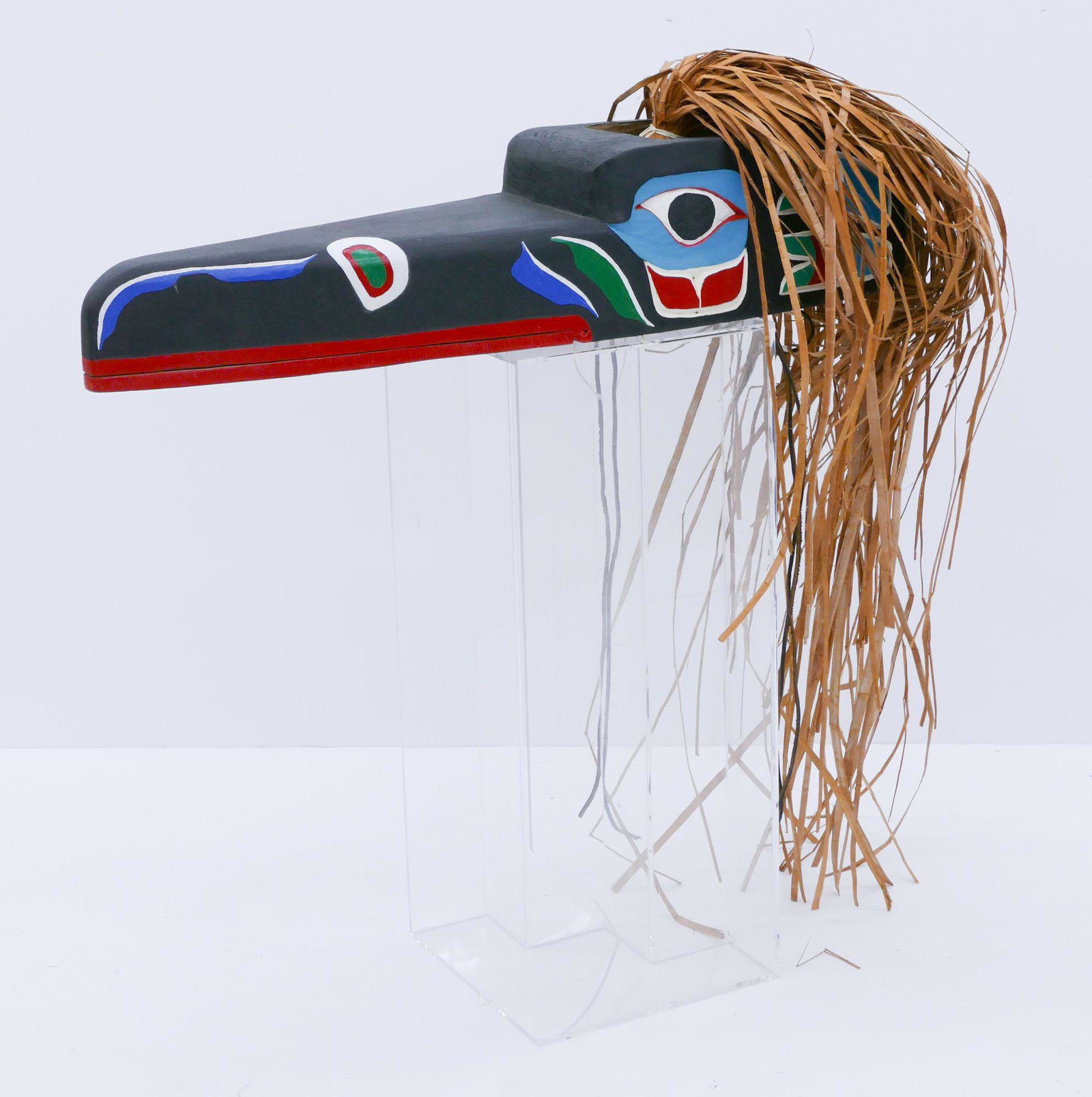 Don Smith ''Makah Raven Mask'' Cedar: Don Smith (20/21st Cent. Makah) ''Raven Mask'' Cedar 9''x28''x8''. Carved and polychrome painted u-form hamatsa mask. Woven cedar bark hair measuring 34'' long total. Signed on interior. Overall excel