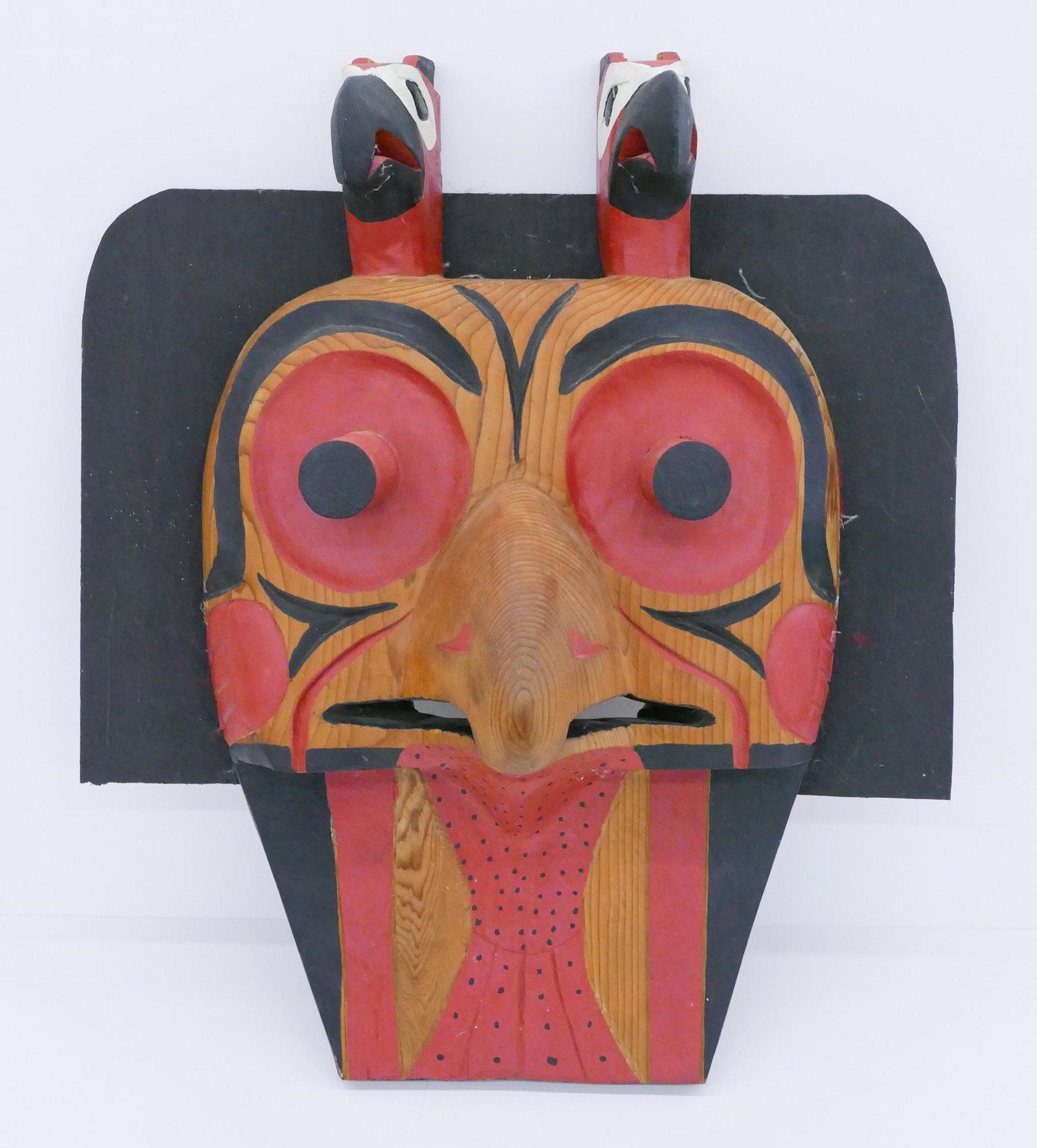 Jacob Joe ''Sxwaixwe Halibut Mask'' Cedar: Jacob Joe (20/21st Cent. Cowichan) ''Sxwaixwe Mask'' Cedar 19''x16''x7''. Unusual carved and polychrome painted u-form mask with double thunderbird finial and halibut. Signed on verso. Overall excelle