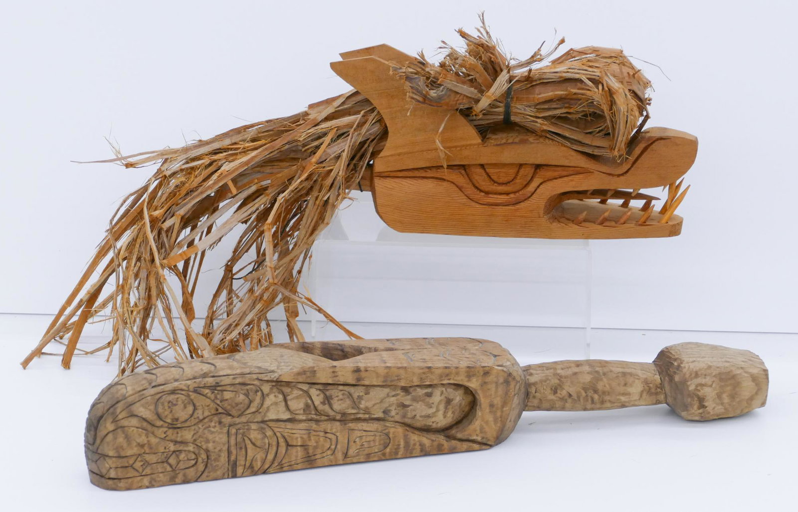 2pc Makah Fish Club and Dance Wand: 2pc Makah Fish Club and Dance Wand 18'' and 24''. Includes a carved Northwest Coast u-form whale fish club by Lewis Romberg. and a figural wolf dance wand attributed to Kevin Della. Club is signed, wa