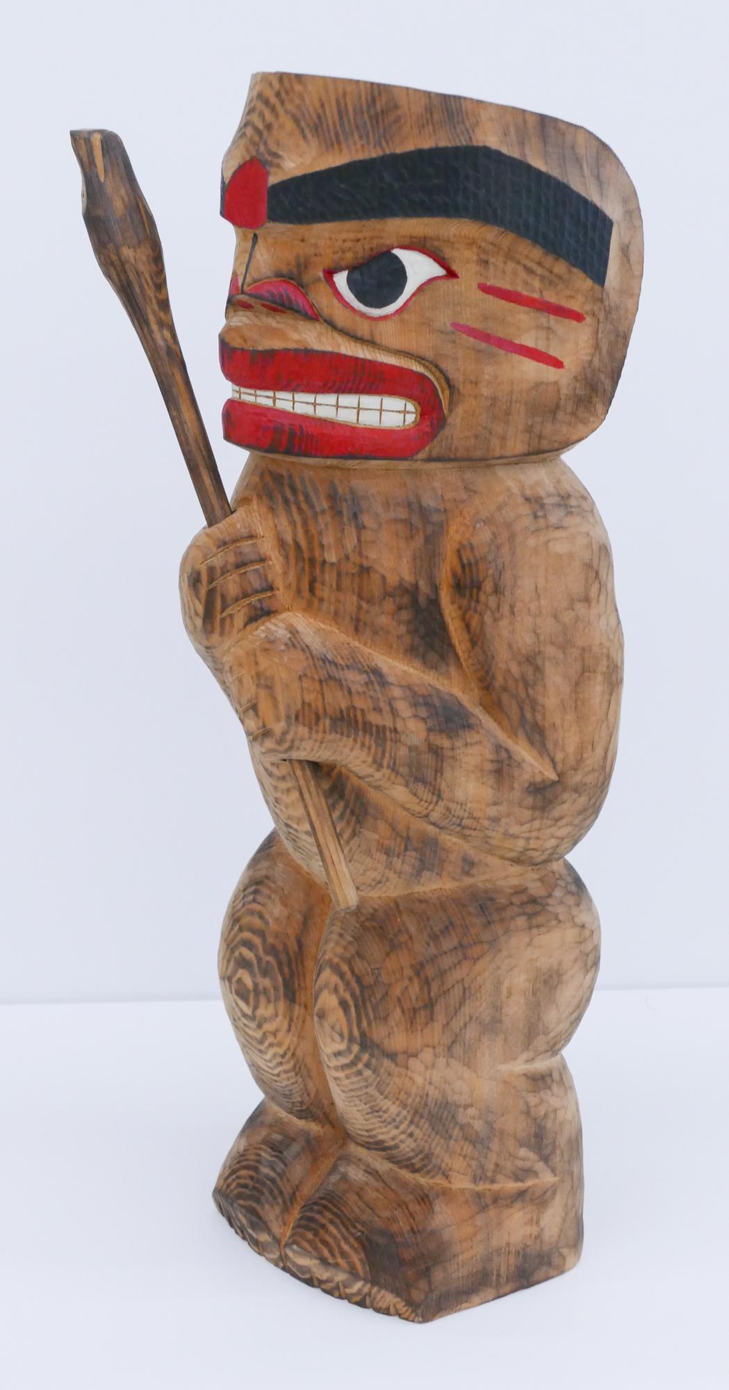 Kimm Brown ''Wild Man Totem'' 1995 Cedar: Kimm Brown (20/21st Cent. Makah) ''Wild Man Totem'' 1995 Cedar 13.5''x4.5''. Carved and polychrome painted u-form totem figure holding club. Initialed on verso. Excellent condition.