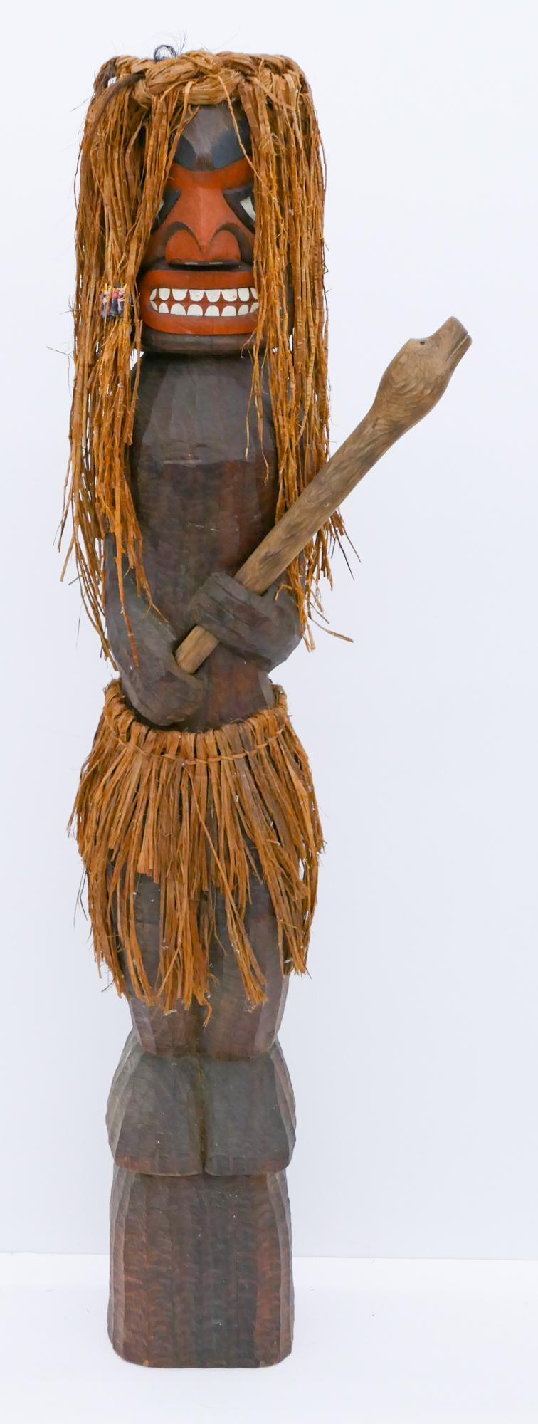 Kimm Brown ''Wild Man Totem Pole'' 1983 Cedar: Kimm Brown (20/21st Cent. Makah) ''Wild Man Totem Pole'' 1983 Cedar 48''x13''x6''. Carved and polychrome painted u-form 4' totem holding a club. Applied cedar bark hair. Initialed on verso. Overall ex