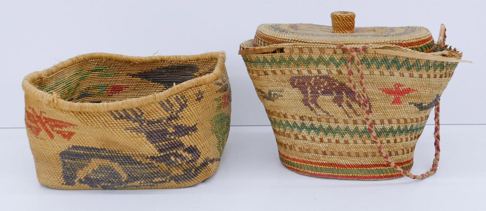2pc Old Makah Pictorial Indian Medium Baskets: 2pc Old Makah Pictorial Indian Medium Baskets 5''x9'' and 7''x11''. Includes an Ada Markishtum square open basket with reclining deer and eagle riding whale motif. Also a covered basket with whale and