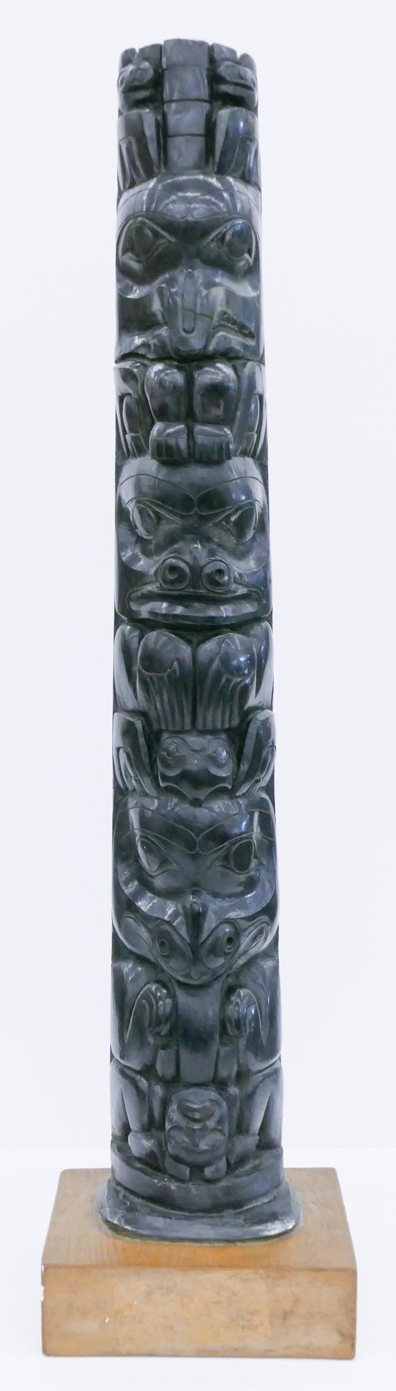 Antique Haida Northwest Coast Argillite Totem Pole: Antique Haida Northwest Coast Argillite Totem Pole 24''x4''x4''. Museum quality large totem pole model with u-form raven, bear, owl, beaver motif. Applied to plaster painted brown platform 26''x6.25''