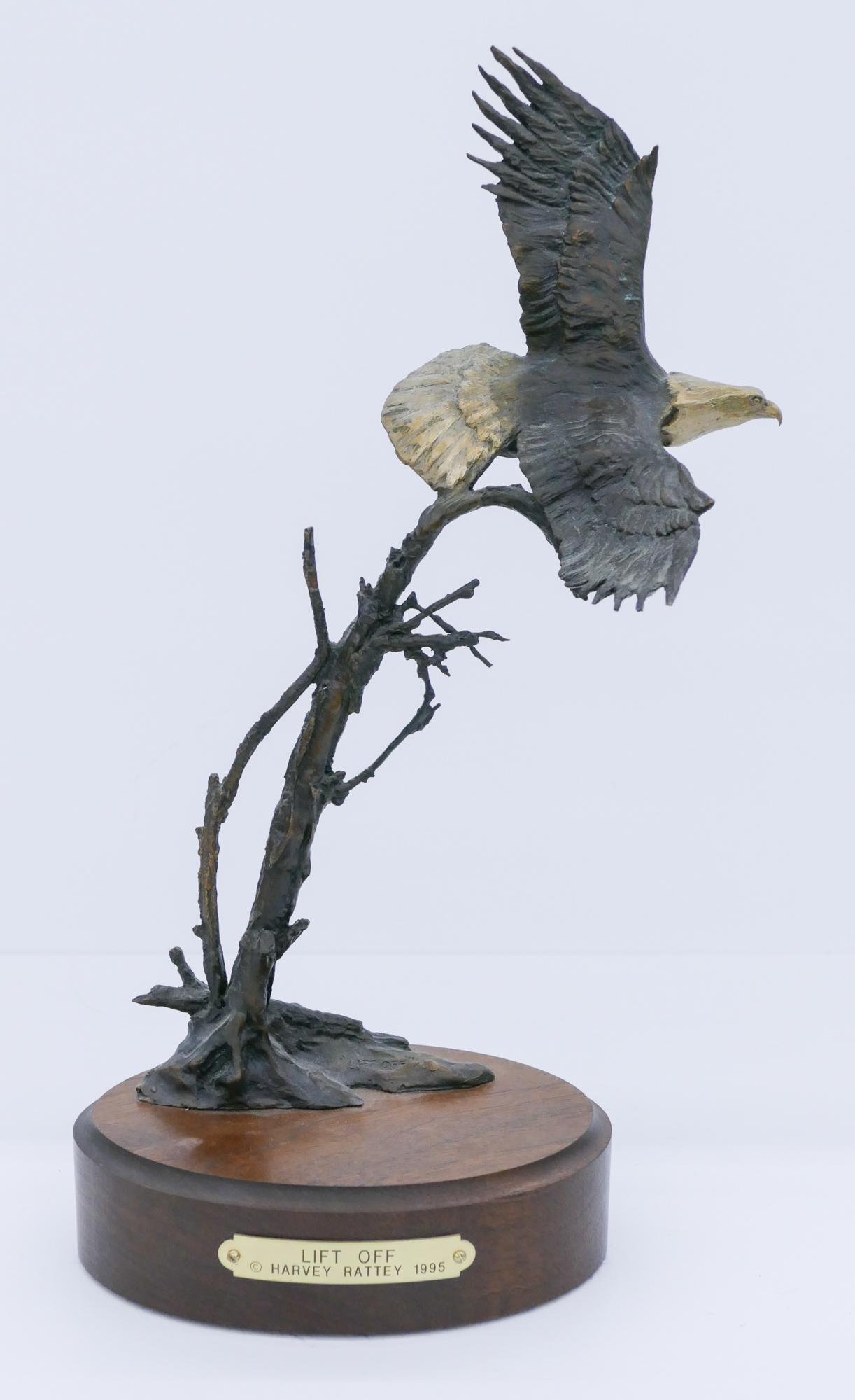 Harvey Rattey ''Lift Off'' (Eagle) 1995 Bronze: Harvey Rattey (1938-2015 Montana) ''Lift Off'' (Eagle) 1995 Bronze Sculpture 15''x8''. Signed and numbered 92 of 200 edition on base. Excellent condition.