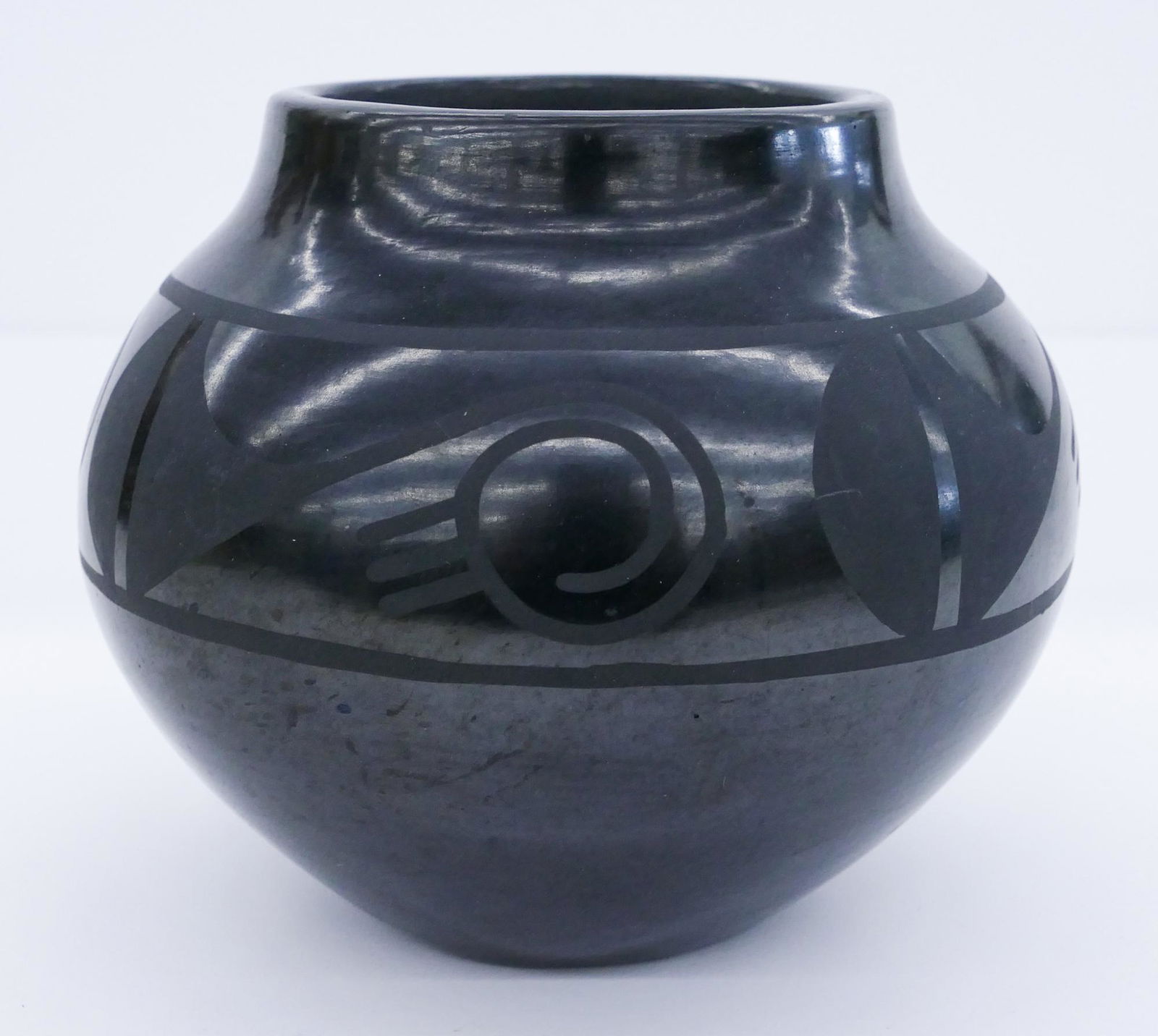 Marie & Julian Martinez San Ildefonso Blackware Jar: Marie & Julian Martinez (20th Cent. San Ildefonso) Decorated Blackware Jar 4.5''x5.5''. Signed ''Marie + Julian'' on bottom. Overall excellent condition.