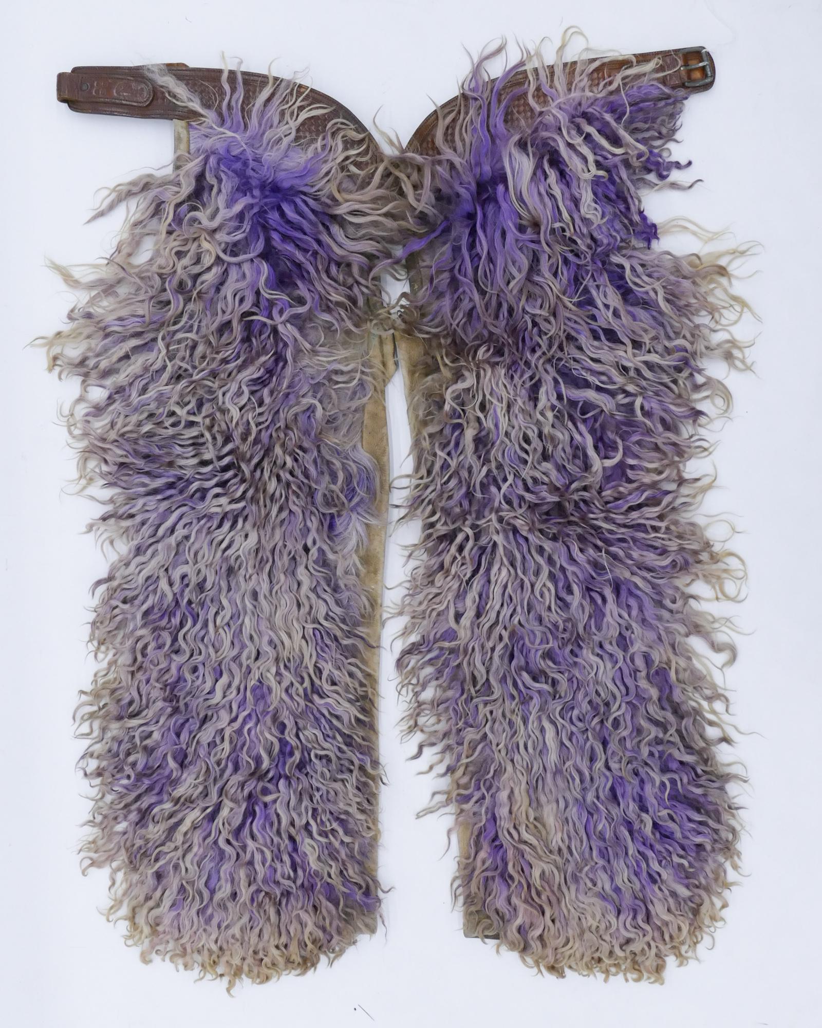 Pair Antique Clark Purple Wooly Angora Show Chaps: Pair Antique Clark Purple Wooly Angora Show Chaps 42''x30''. Scarce pair of leather angora chaps. Impressed ''Clark Portland'' (John Clark) on leather belt. Scattered surface wear from use. Overall ex