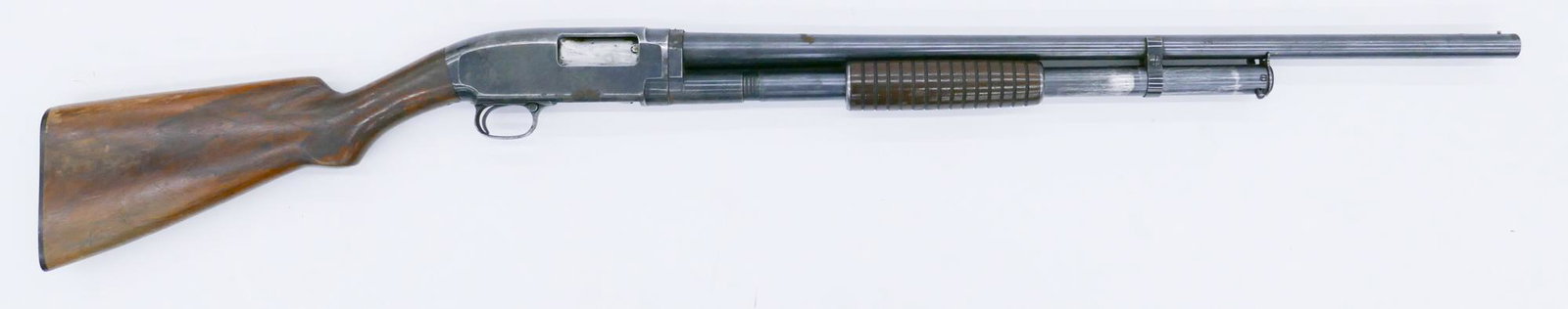 Winchester Model 12 Pump Action 16 Gauge Shotgun: Winchester Model 12 Pump Action 16 Gauge Shotgun 44''. It has a 25'' barrel. Full choke. Matching serial numbers 326410. Scattered surface wear with some rusting. Lot requires FFL or background check 