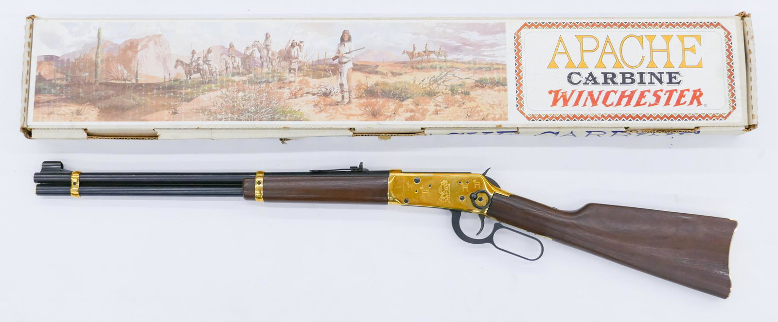 Winchester Model 94 Apache Carbine .30-30 Rifle with Box: Winchester Model 94 Apache Carbine .30-30 Rifle with Box. Lever action .30-30 Win. with a 20'' barrel. Serial number AC2015 with matching box. Overall clean condition with some scattered surface scrat