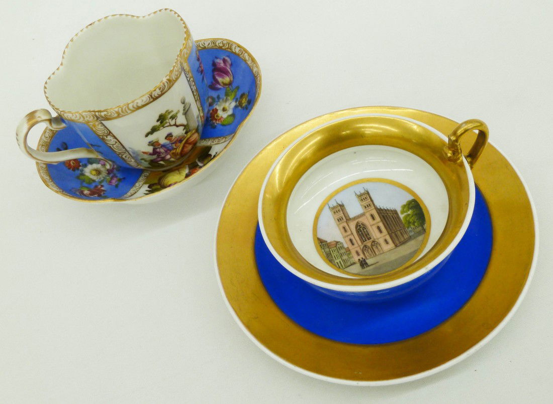 (2) Meissen & KPM Hand Painted Cabinet Cup Saucers: (2) Meissen & KPM Hand Painted Cabinet Cup Saucers with Courting & Cathedral Hand Painted Scenes