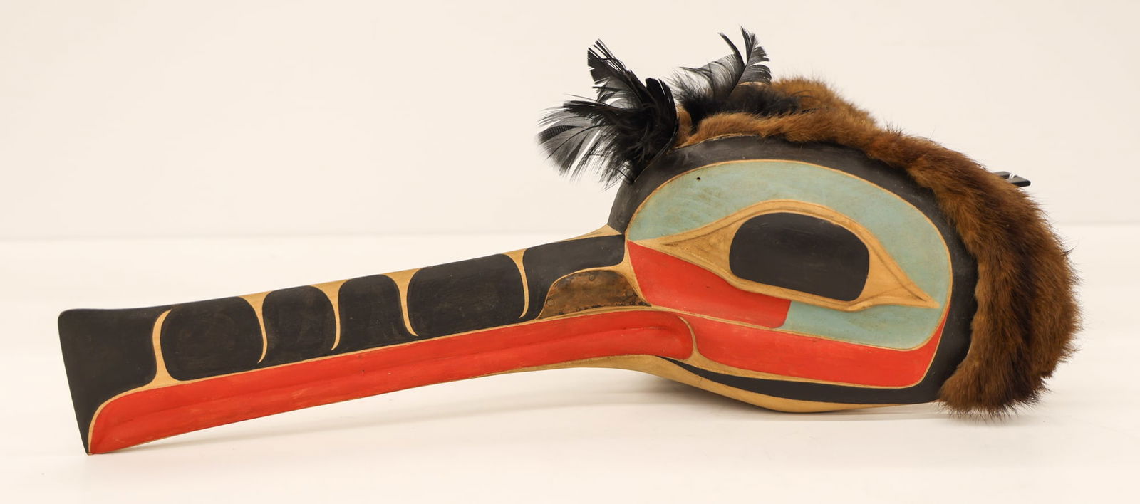 Duane Pasco ''Mosquito Mask'' 1973 Painted Cedar Mask: Duane Pasco (b.1932 Washington) ''Mosquito Mask'' 1973 Painted Cedar 6''x17''. Polychrome painted and carved u-form mask with applied copper. Signed and dated on interior. Overall excellent condition.