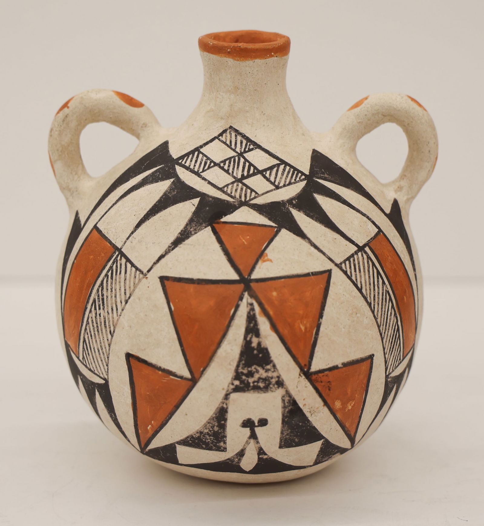 Rose Chino Garcia Acoma Polychrome Decorated Flask: Rose Chino Garcia (1928-2000 Acoma) Polychrome Decorated Flask 6''x5.5''. Polychrome decorated with geometric motifs. Signed on verso. Some minor scattered surface marks. Overall excellent condition.
