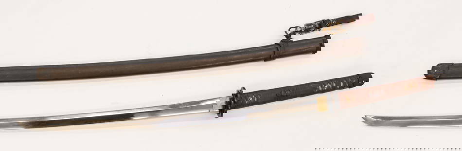 WWII Japanese Shin Gunto Katana Sword: WWII Japanese Shin Gunto Katana Sword 40''. It has a 34.75'' blade to end of tang. Tang is signed on both sides. Some scattered wear from age, though blade is quite clean. Lock from scabbard to handle