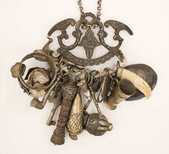 Antique Afro-Brazilian Silver Penca de Balangandan: Antique Afro-Brazilian Silver Penca de Balangandan 8''x6''. Includes (20) various animals, amulets and charms of fortune. It comes on a silver link 42'' necklace. 19th century. It weighs 902 grams tot