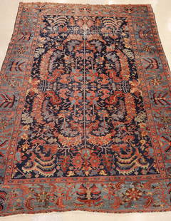 Antique Persian Oriental Room Size Rug: Antique Persian Oriental Room Size Rug 8'4''x11'2''. Scrolling floral medallion-like field against a blue ground. Scattered wear from age. Possibly a Heriz.