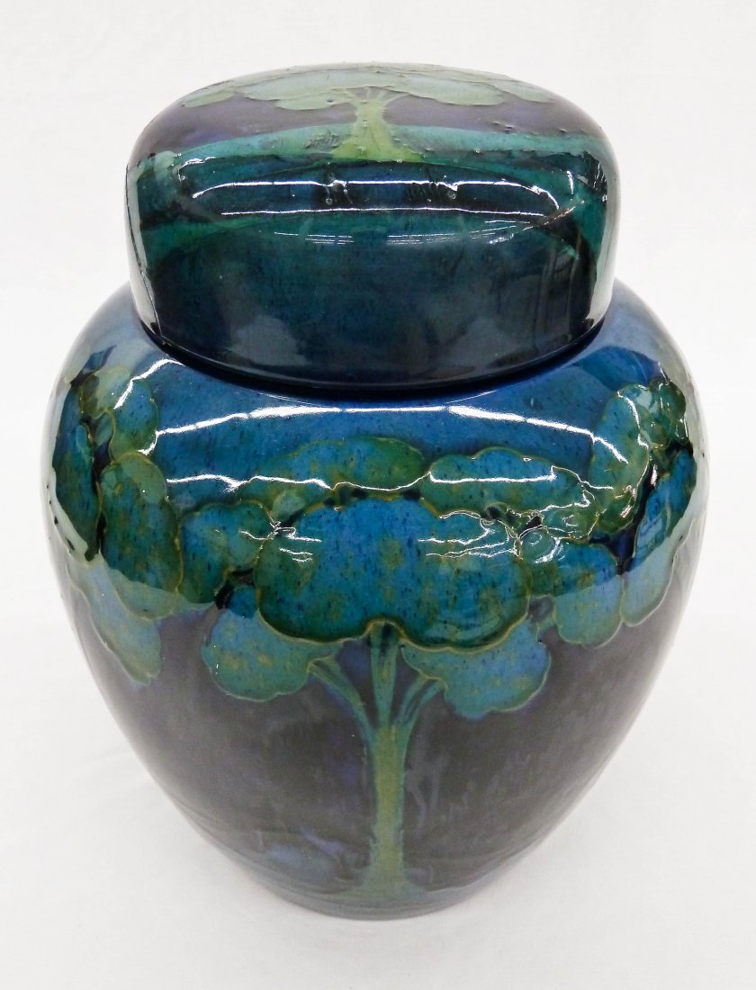 William Moorcroft ''Eventide'' Arts & Crafts Moonli: William Moorcroft ''Eventide'' Arts & Crafts Moonlit Blue Covered Jar with Tree Designs 9.5''x7.5''. Repair to lid. Some slight glaze scratching to base. Bottom is signed by William Moorcroft and lid 