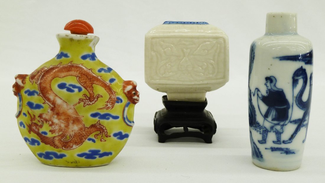 (3) Chinese Porcelain Snuff Bottles & Ink Pot. Siz: (3) Chinese Porcelain Snuff Bottles & Ink Pot. Sizes range 2.75'' to 3''. Yellow dragon snuff has multiple chips and wear. No other damage.