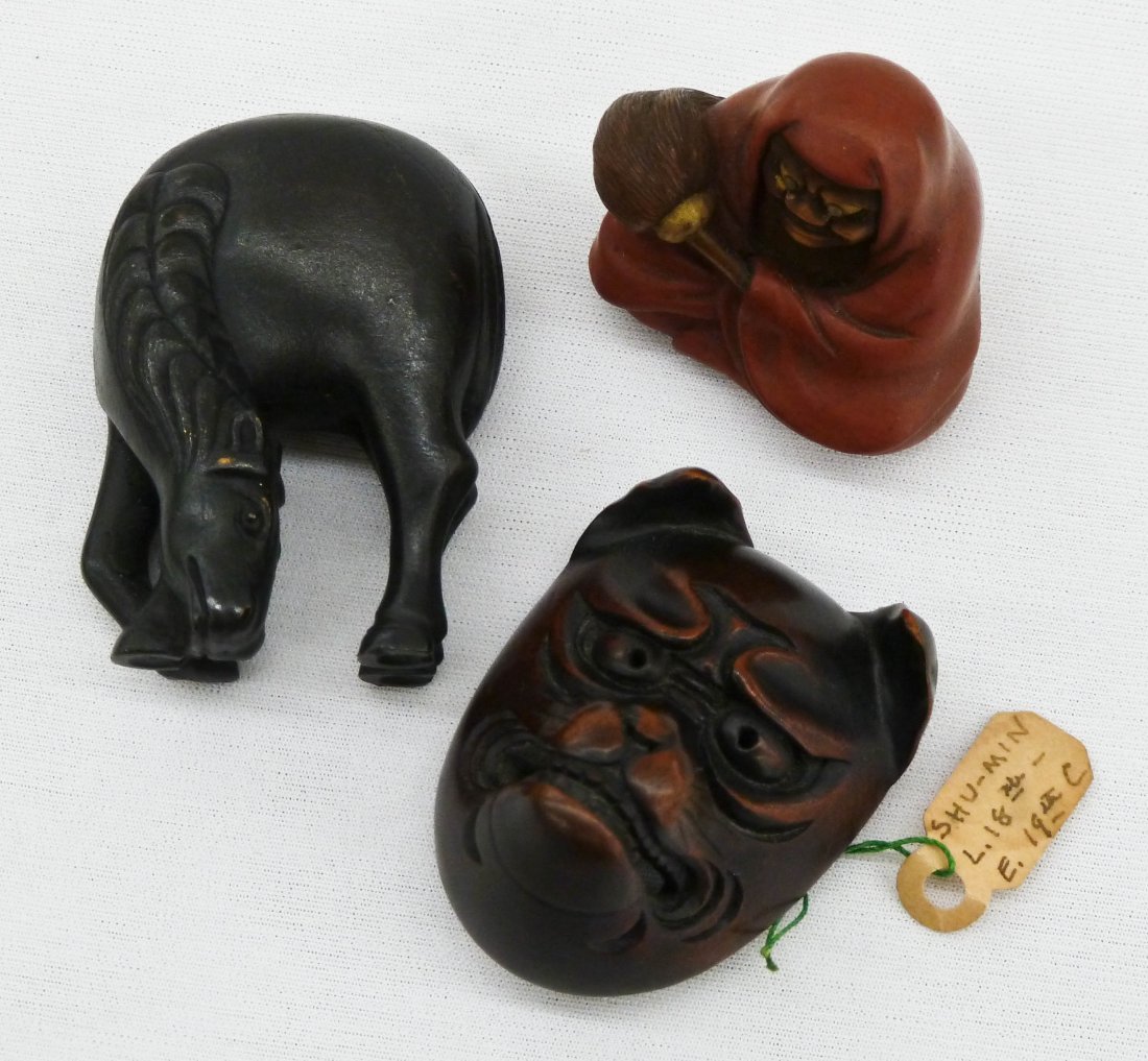 (3) Japanese Netsuke Ornaments. Shumin Dog Noh Mas: (3) Japanese Netsuke Ornaments. Shumin Dog Noh Mask 1.5'', Lacquered Wood Daruma 1.25'', and Bronze Horse 2''.
