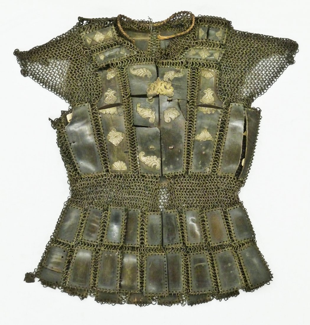 Moro Philippines Chain Mail with Kabau Horn Plates: Moro Philippines Chain Mail with Kabau Horn Plates Chest Suit of Armor 27''x28''. Steel buckles. Some horn plates are cracked. 19th century.