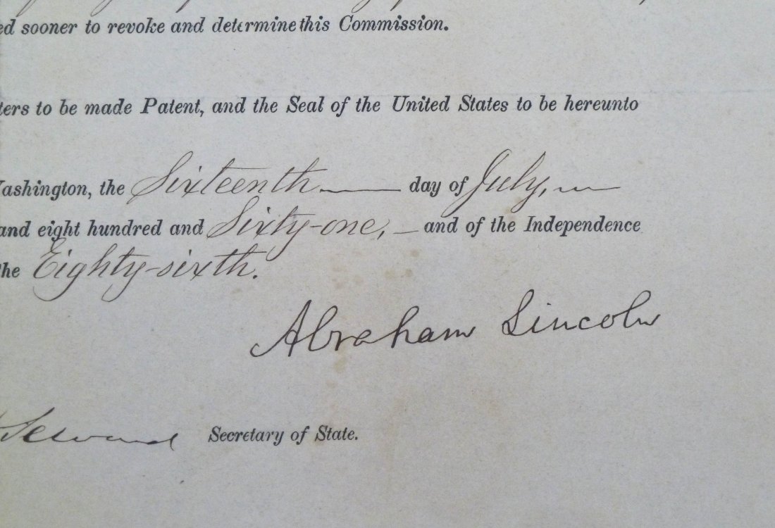 Abraham Lincoln Signed Presidential Appointment 18: Abraham Lincoln Signed Presidential Appointment 1861 Document for Postmaster of Springfield, Massachusetts 10''x17''. Full, bright signature. Fading to document seal. Framed in display 16''x29''.