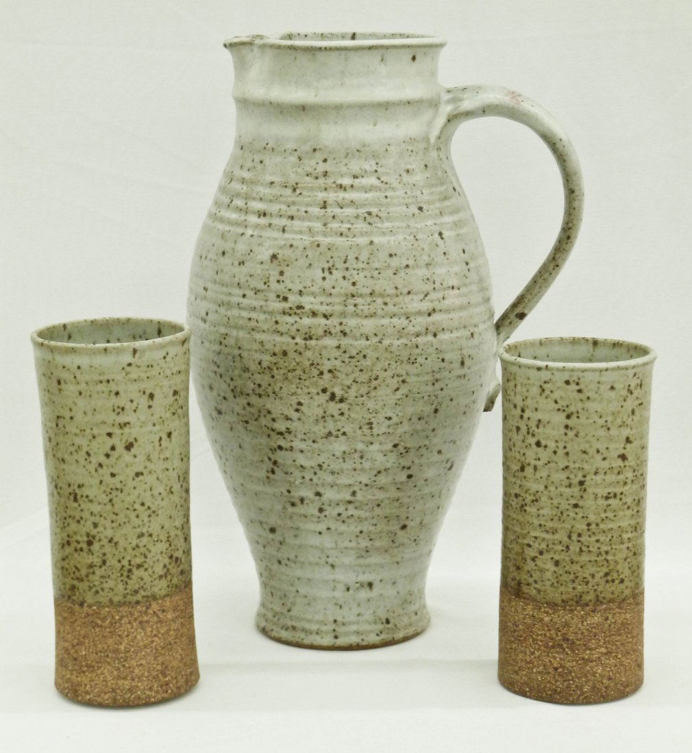 David Shaner (20th Cent. MT) Studio Pottery Speck: David Shaner (20th Cent. MT) Studio Pottery Speckled Glaze 12.5'' Pitcher & (8) Glasses Drink Set. Each tumbler measures 6.5'' to 7.5''. No damage.