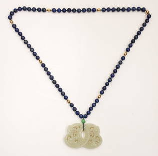 Chinese Lapis with Jade Pendant Necklace: Chinese Lapis with Jade Pendant Necklace 36''. Includes 10mm lapis lazuli beads and gold ball fittings. Scrolling pale celadon carved jade chilong pendant that is decorated on both sides