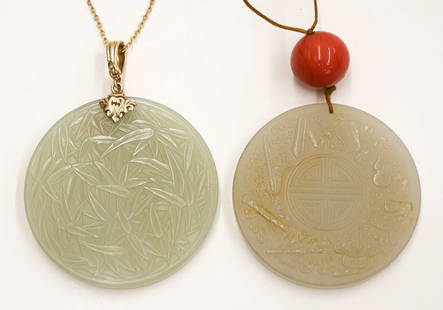 2pc Fine Chinese Jade Disc Pendant Necklaces: 2pc Fine Chinese Jade Disc Pendant Necklaces. Includes a pale celadon bamboo motif disc with a 14k mount 2.25''. Also a pale whitish celadon shou disc with the eight auspicious buddhist symbols