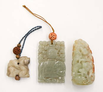 3pc Chinese Jade Pendants and Toggle: 3pc Chinese Jade Pendants and Toggle 1.25'' to 2.5''. Includes a pierced russet splash pebble with lion and lingzhi motifs, a pierced recumbent elephant tablet, and grey foo lion toggle. Overall