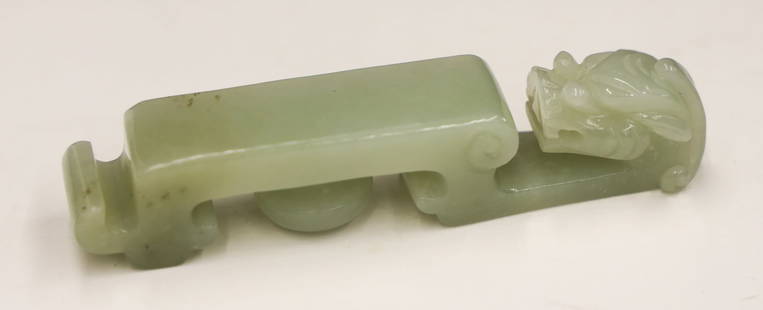 Chinese Jade Archaic Dragon Belt Hook: Chinese Jade Archaic Dragon Belt Hook 4''x.75''. Carved pale celadon figural belt hook. Excellent condition. 20th century or older.