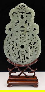 Chinese Jade Chilong and Bi Disc Plaque on Stand: Chinese Jade Chilong and Bi Disc Plaque on Stand 8.25''x3.75''. Pierced celadon jade with opposing chilongs and disc. Carved and fitted rosewood stand, measuring 6.25''x3.75'' without. Overall