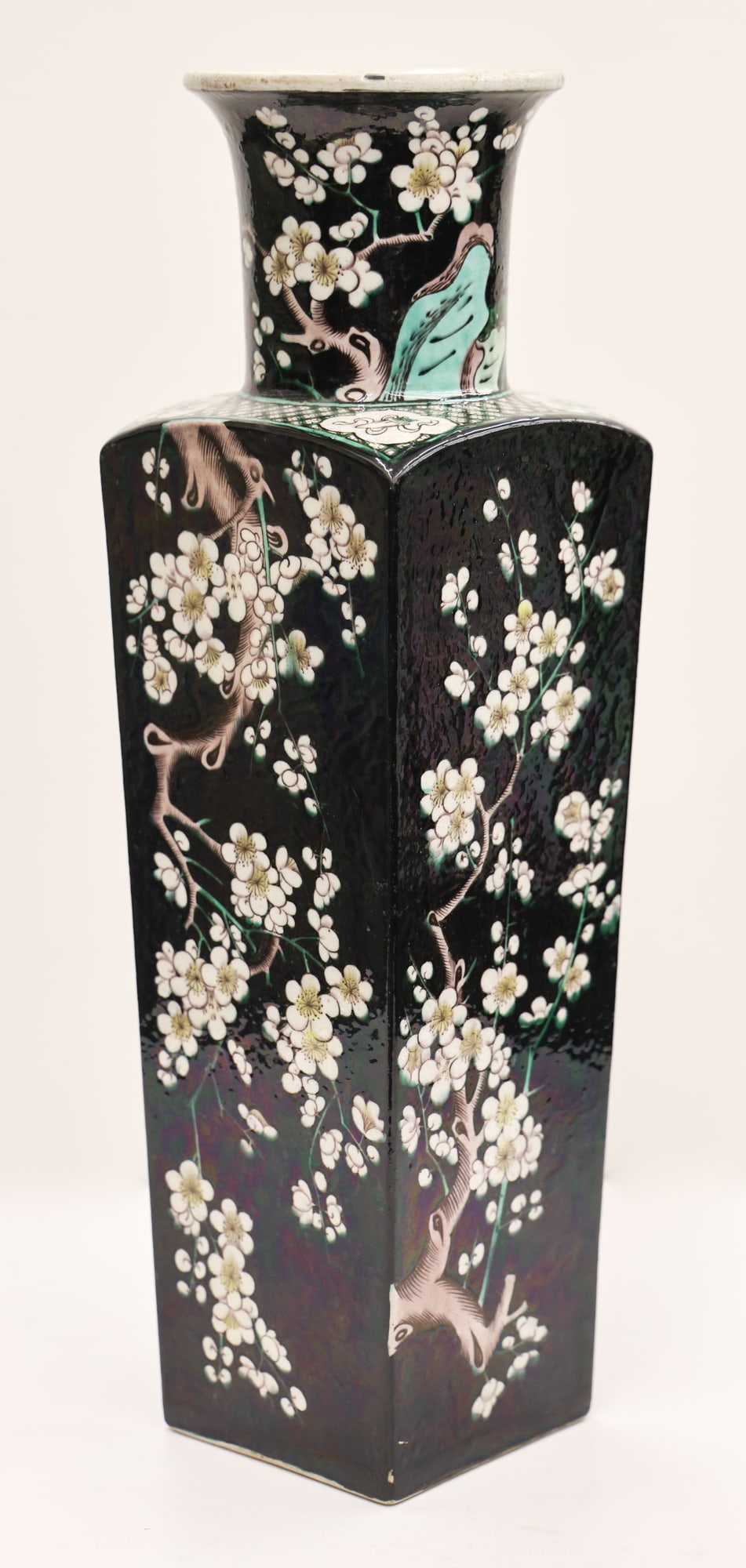 Chinese 18th Cent. Famille Noir Prunus Vase: Chinese 18th Cent. Famille Noir Prunus Vase 17.5''x7''. Exceptional black and green enamels with white blossoming prunus flowers. Unmarked. One minor glaze flake to bottom edge corner. Overall excelle