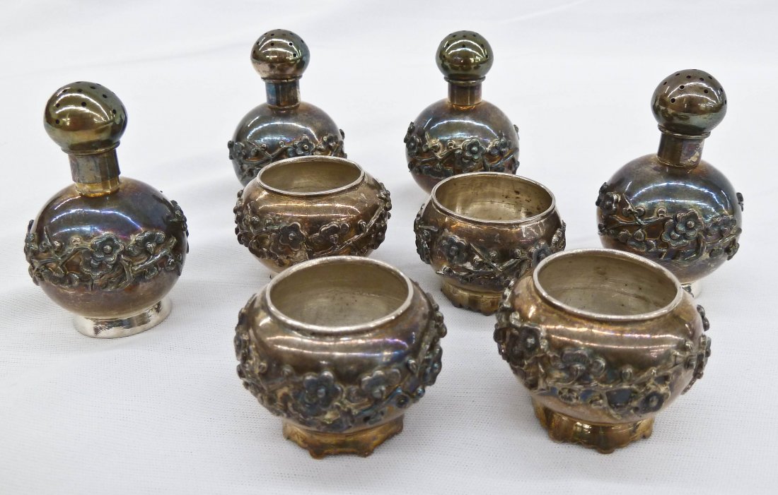 Set of (4) Chinese Export Silver Salt Cellar & Pepp: Set of (4) Chinese Export Silver Salt Cellar & Pepper Shaker Sets with Applied Floral Decoration 1'' to 2'' Each. Total group weighing 5.5 troy ounces. No damage.