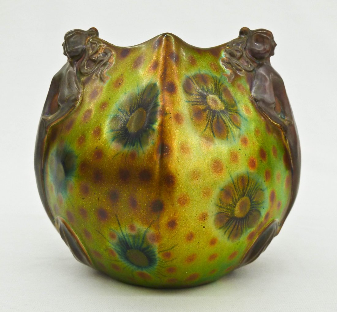 Zsolnay Art Nouveau Figural Iridescent Cabinet Vase: Zsolnay Art Nouveau Figural Iridescent Cabinet Vase 3.75''x4.5''. Figural female ends with butterfly wing type patterning. Form 6497. No damage