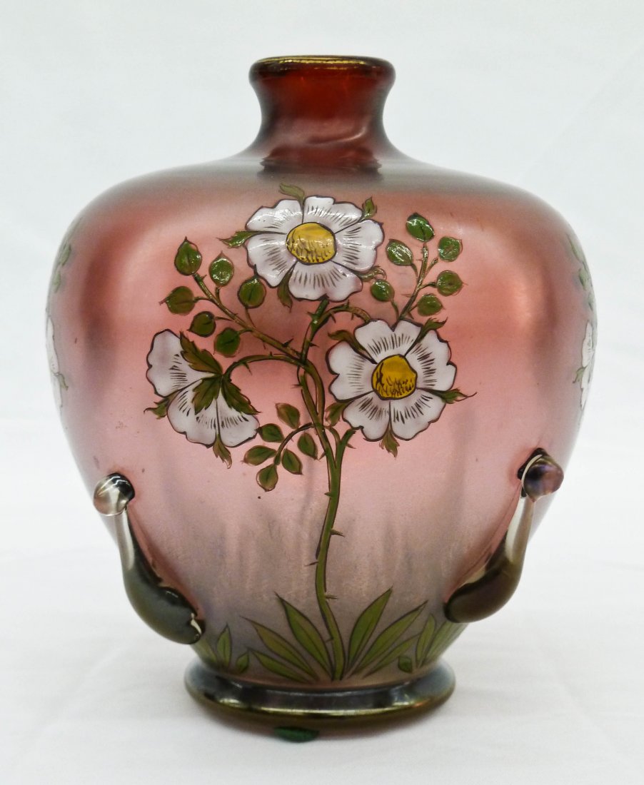 Loetz Attr. Enameled Art Glass Iridescent Vase 4.5: Loetz Attr. Enameled Art Glass Iridescent Vase 4.5''x4''. Floral motifs with applied arms to sides. May be Harrach or Kralik. No damage.