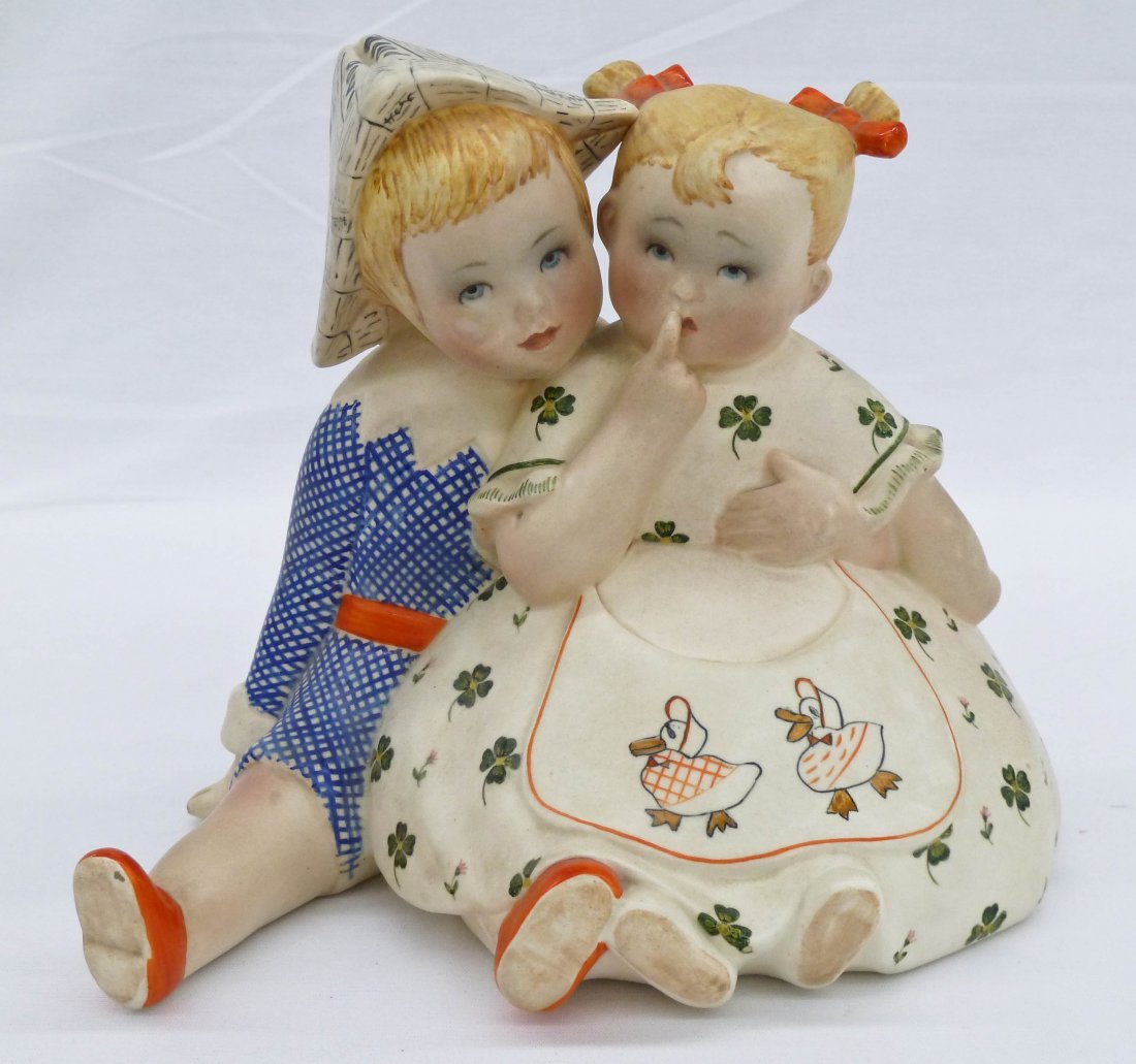 Lenci Italy Ceramic Figure Group of Children 6.5'': Lenci Italy Ceramic Figure Group of Children 6.5''x7'. Boy has painted newspaper hat and girl has clovers and ducks on dress. Small glaze rub to boy's hand.