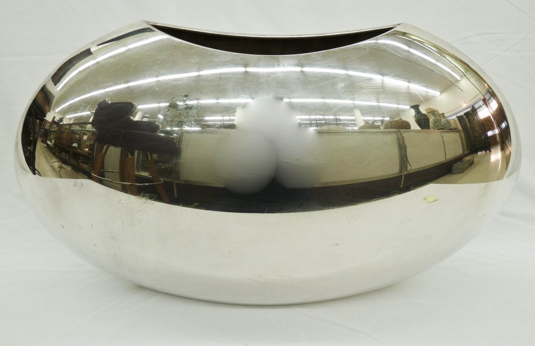 Lino Sabattini (b.1925 Italian) ''Sin'' Silver Pla: Lino Sabattini (b.1925 Italian) ''Sin'' Silver Plated Vase 11''x19''x6''. Titled on side and signed on bottom. Some light scratching.