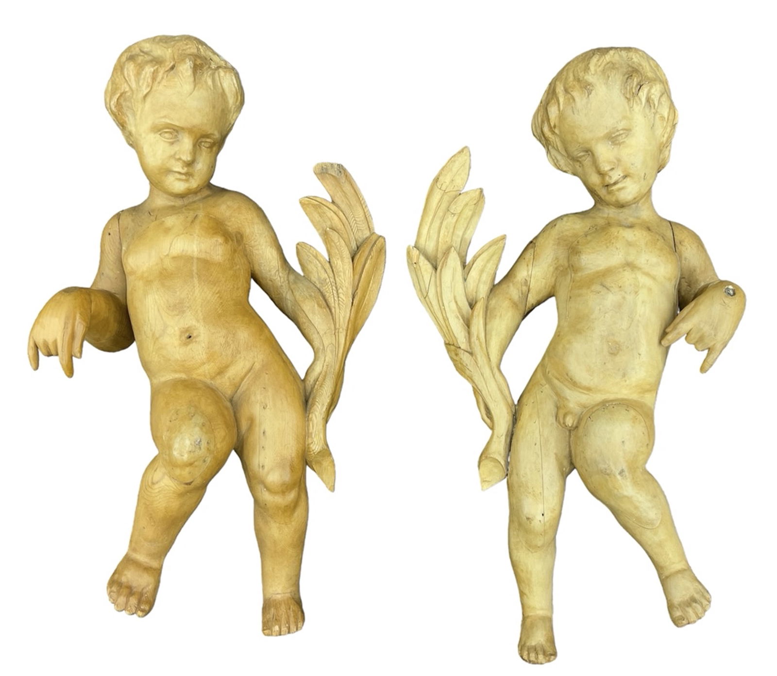 Pair Antique French Carved Hanging Cherubs: Pair Antique French Carved Hanging Cherubs 37''x21'' Approx. True opposing pair of hanging architectural wood putti. Some age cracking and old repairs. 19th century.