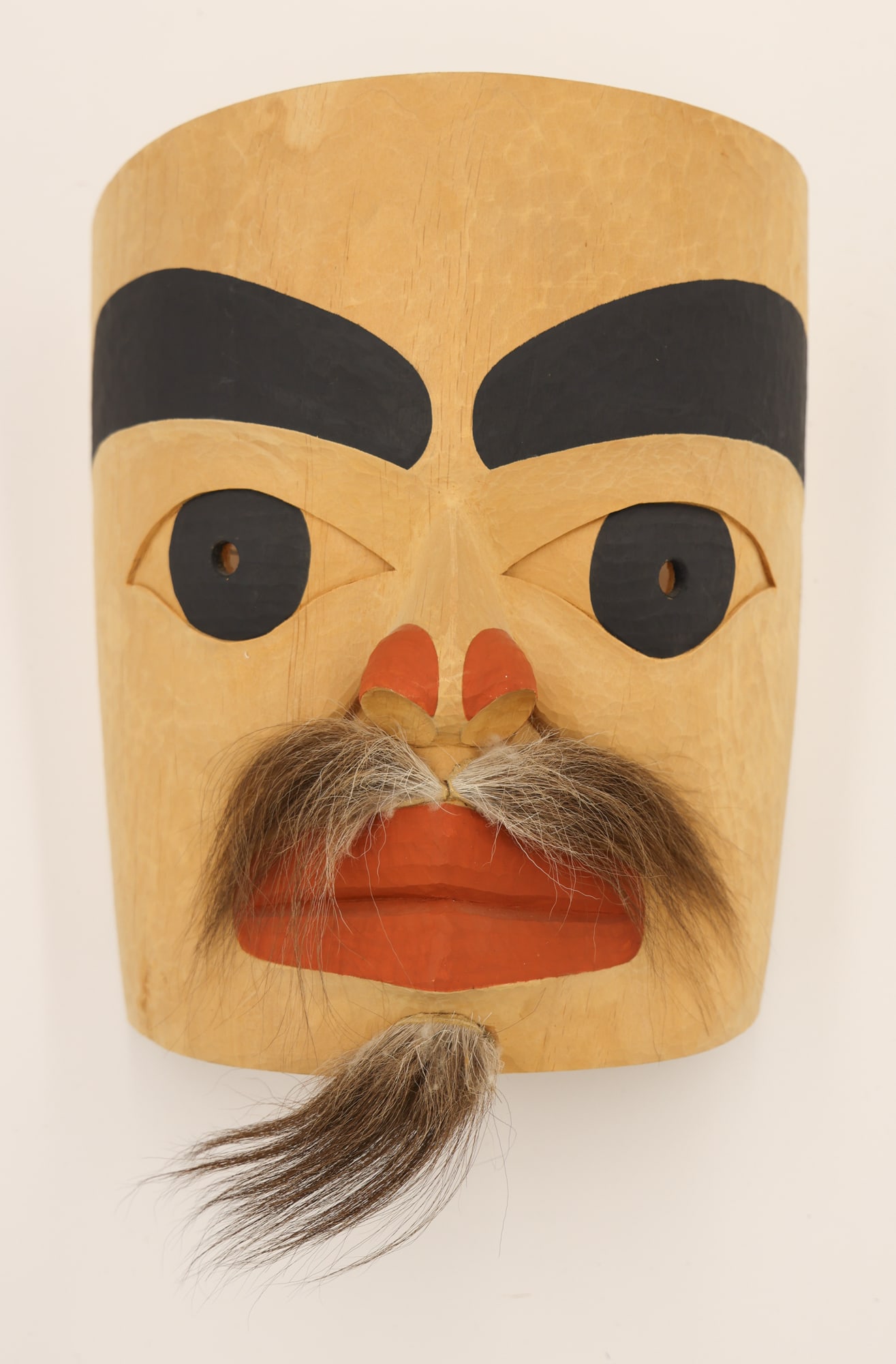 Andy Wilbur Peterson ''Old Man'' Alder Mask: Andy Wilbur Peterson (b.1955 Skokomish) ''Old Man'' Alder Mask 14''x11''x7''. Polychrome painted and carved with applied hair. Signed and titled on verso. Excellent condition.