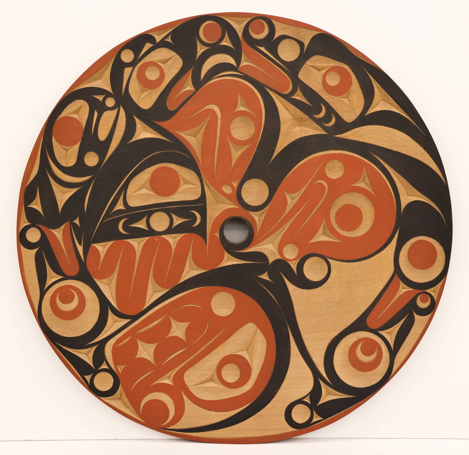 Andy Wilbur Peterson ''Eagle & Salmon'' (Spindle Wheel): Andy Wilbur Peterson (b.1955 Skokomish) ''Eagle & Salmon'' (Spindle Wheel) 1997 Cedar Round Panel 42''. Exceptional polychrome painted and carved u-form relief panel. Signed and titled on verso. Excel
