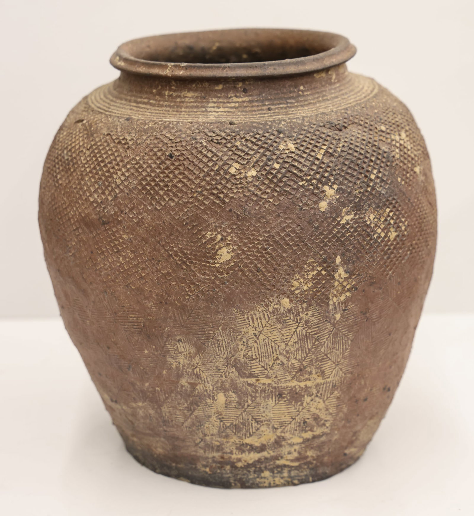 Chinese Western Zhou Storage Jar: Chinese Western Zhou Storage Jar 11.5''x10.5''. Brown ceramic jar with textured surface. Overall excellent condition. 400 to 200 BCE, Western Zhou dynasty.