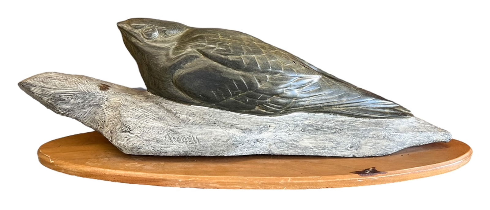Tony Angell ''Nighthawk'' 1984 Stone Sculpture: Tony Angell (b.1940 Washington) ''Nighthawk'' 1984 Stone Sculpture 6.5''x19''. Carved steatite stone bird sculpture. Signed on side with title label on underside. A few small surface stains to stone a
