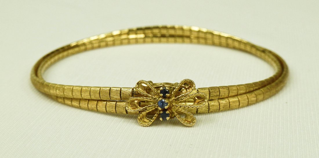 18k Sapphire Double Strand Bracelet with Bow Clasp. Wei: 18k Sapphire Double Strand Bracelet with Bow Clasp. Weighing 17.17 grams total weight.