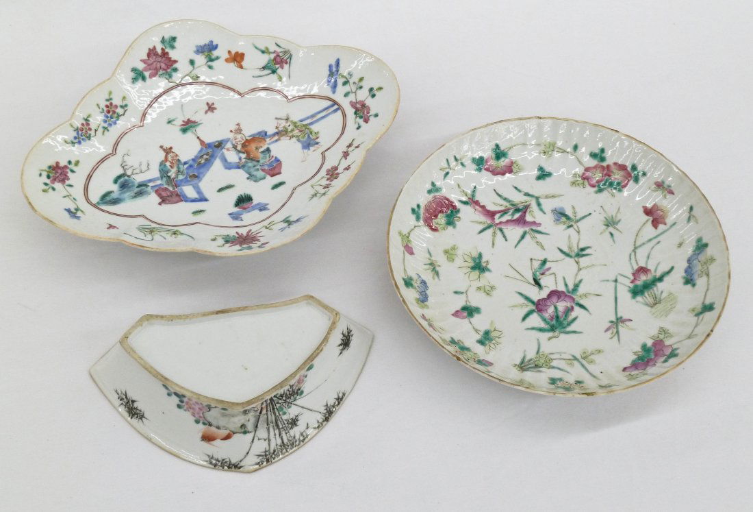 (3) Pieces Chinese Famille Rose Porcelain. Includes 9.2: (3) Pieces Chinese Famille Rose Porcelain. Includes 9.25'' lotus flower bowl (hairline and chip), 11'' scalloped pedestal bowl with figures at table, and 7.5'' bat shaped dish with calligraphy. All 19