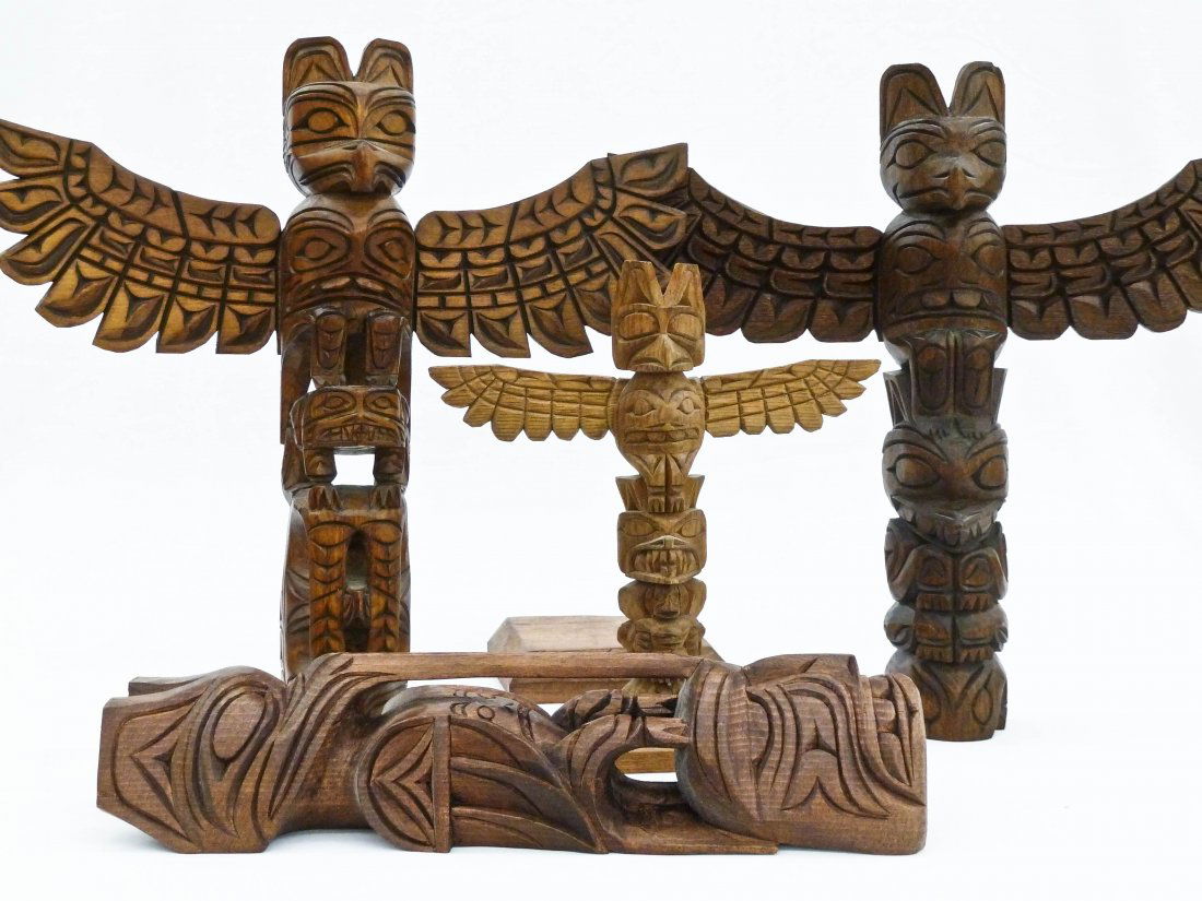 Group (4) Northwest Carved Totems by Each Member of the: Group (4) Northwest Carved Totems by Each Member of the Williams Family. Include Ray Williams 8.5'' Thunderbird, John Williams 12.75'' Bird, Erik Williams 12'' Thunderbird, and Rick Williams 12'' Thun