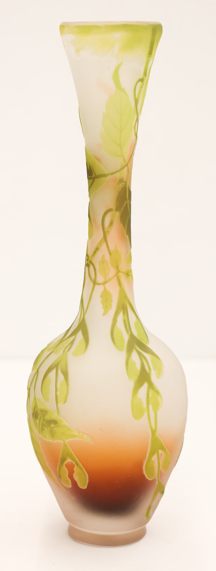 Galle French Cameo Glass Maple Leaf Tall Vase: Galle French Cameo Glass Maple Leaf Tall Vase 13.5''x4.25''. Green to clear coloring with maple leaf and samara seed pod motifs. Signed on side. Overall excellent condition. Early 20th century.