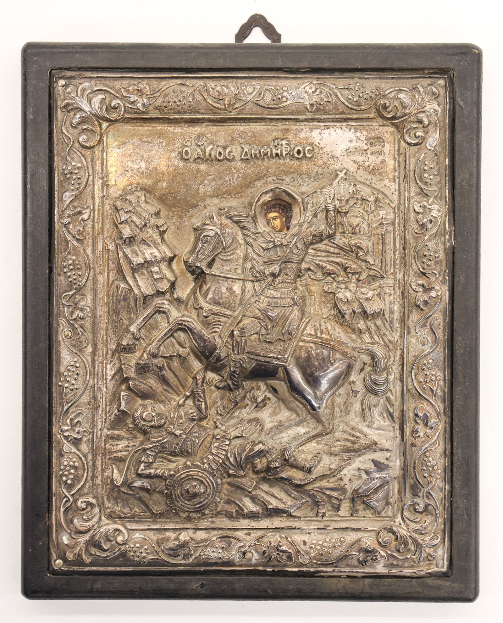Greek Orthodox 950 Silver St. George Oklad Icon: Greek Orthodox 950 Silver St. George Oklad Icon 9.5''x7.5''. Marked 950 silver repousse oklad of St. George over a painted wood icon. Excellent condition. 20th century.