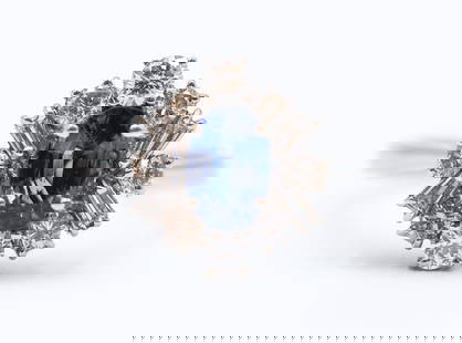 Ladies 18k Sapphire and Diamond Ring: Ladies 18k Sapphire and Diamond Ring Size 9.25. Includes one transparent, medium-dark to slightly violetish-blue oval mixed cut sapphire corundum measuring 7.74x5.18x3.87mm, clarity grade M1. Also