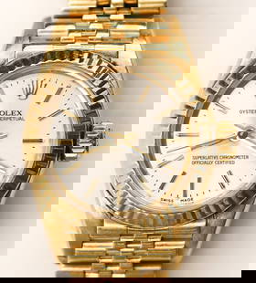 Ladies Rolex Oyster Perpetual 18k Presidential Wrist Watch Ref.67198: Ladies Rolex Oyster Perpetual 18k Presidential Wrist Watch Ref.67198. Silver dial with 24mm bezel. Solid 18k gold case and jubilee band 8571. Serial number N447127, year of manufacture 1991. Overall