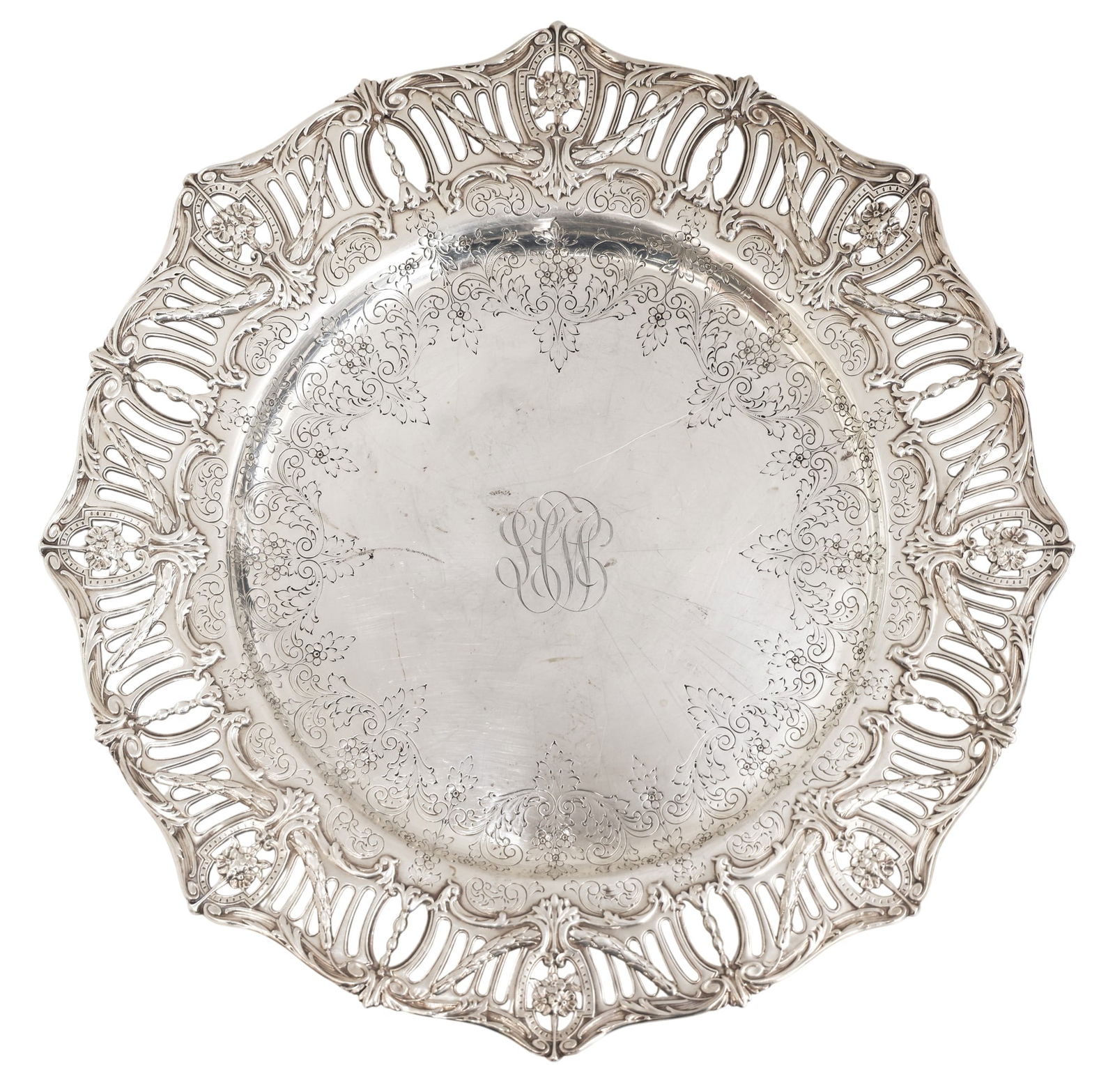 Graff Washbourne & Dunn American Sterling Reticulated Charger: Graff Washbourne & Dunn American Sterling Reticulated Charger 13.5". Monogrammed "LCW" with "Louise Clark Whitaker 1914" inscription on underside. Hallmarked Sterling with form number 3932/47. Some sc
