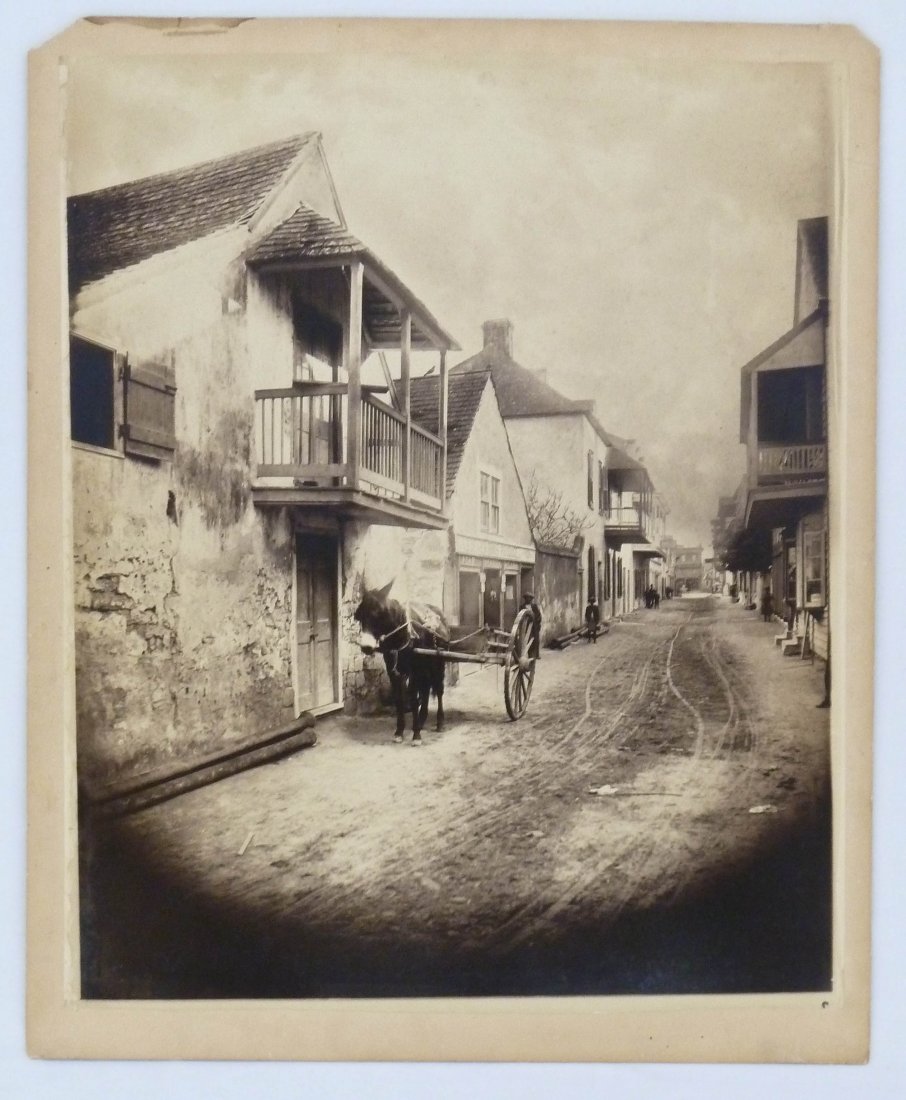 George Barker (1844-1894 American) Charlotte Street at: George Barker (1844-1894 American) Charlotte Street at Baya, St. Augustine, Florida Albumen Photograph 21.5"x17.75" Image. Mounted to board 24"x20". Dated 1886 with Gardiner Brothers Produce store fro