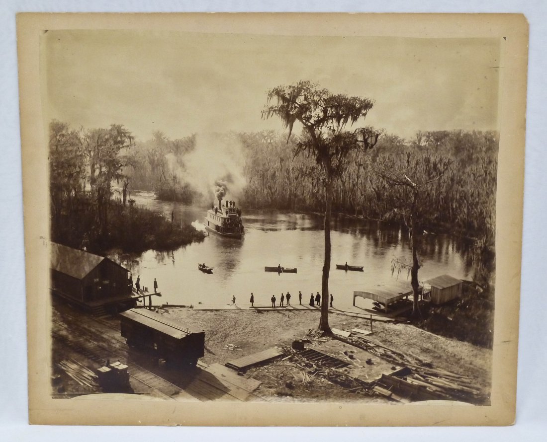 George Barker (1844-1894 American) On The Shore of Silv: George Barker (1844-1894 American) On The Shore of Silver Spring in Marion County, Florida from the Morgan House Albumen Photograph 18"x21.75" Image. Mounted to board 20"x24". Dated 1886 with steamshi
